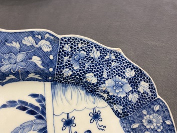 A large oval Chinese blue and white 'Romance of the Western Chamber' dish, Qianlong